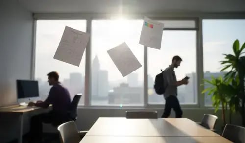 Documentos flotando en el aire, en una oficina acristalada por la que entra el sol. Artículo de Bigle CLM sobre legal design thinking.