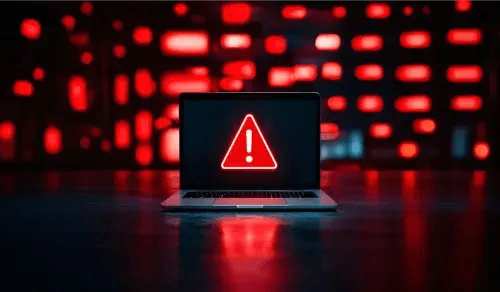 Laptop displays a warning sign against a background of neon lights. Bigle Legal article on legal operations.