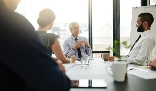 Legal department business meeting. Bigle Legal CLM article to empower the in-house lawyer.