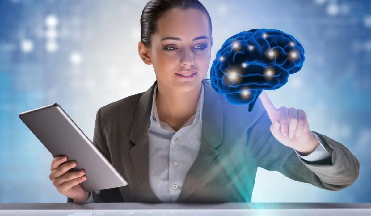 A woman in a suit with a tablet touches a hologram of a brain. Bigle Legal article on artificial intelligence for lawyers.