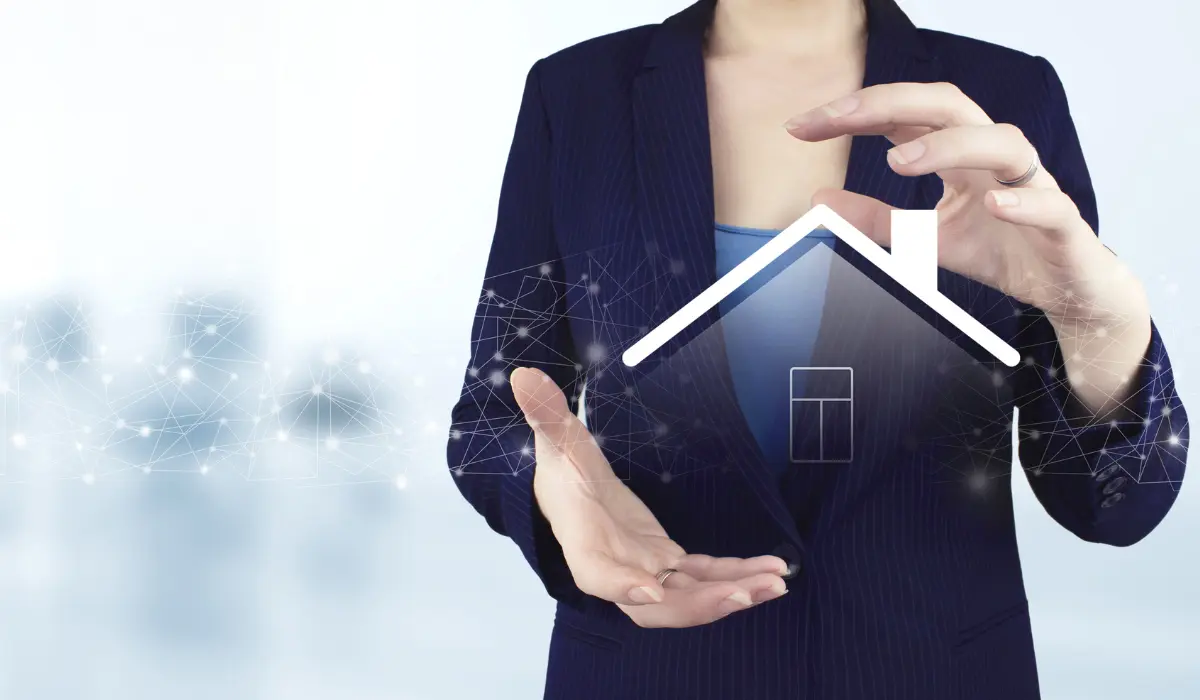Woman in a suit with a hologram of a house. Bigle Legal article on proptech.